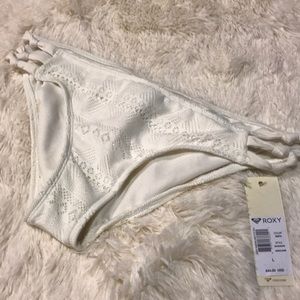 Roxy eyelet crochet look swim suit bottoms.